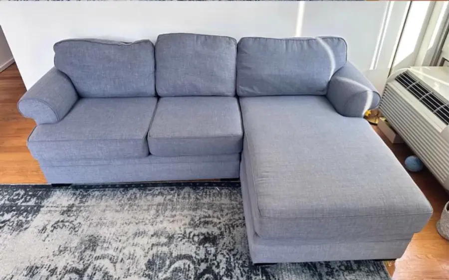 After cleaning: blue-gray sectional with chaise
