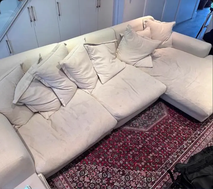 Before cleaning: cream chaise sectional