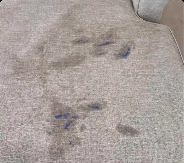 Before cleaning: stained fabric close-up