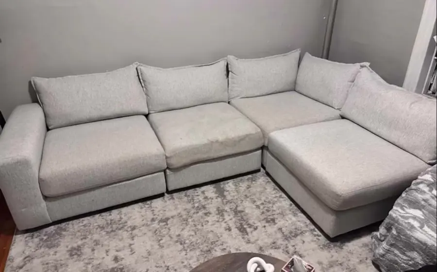 Before cleaning: gray sectional