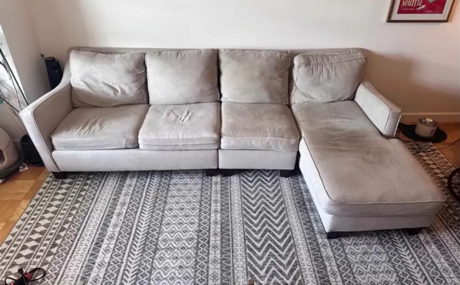 Before cleaning: gray sectional with chaise