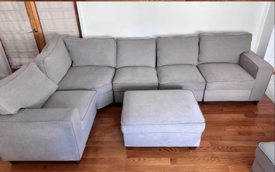 After cleaning: gray U-shaped sectional with ottoman