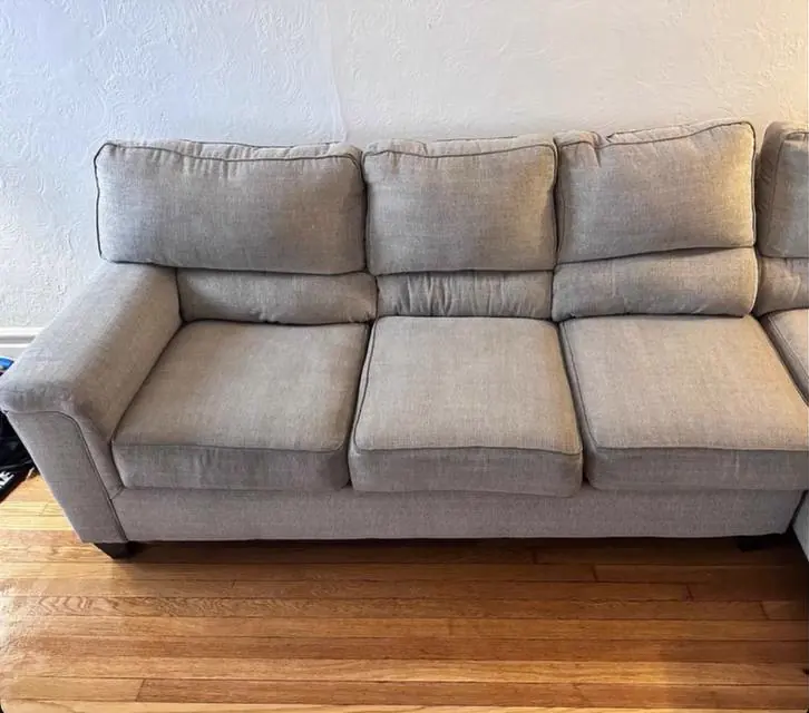 After cleaning: linen-look three-seat sofa